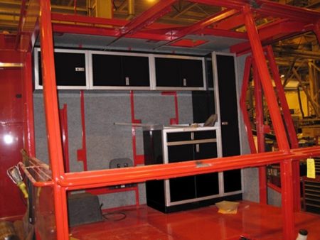 Cab Interior for a Crane with Moduline Closet, Base Cabinet and Wall Cabinets