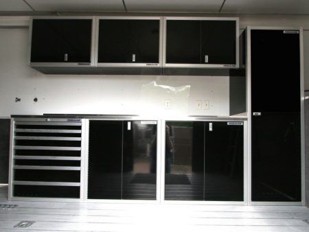 Moduline Signature Black Aluminum Cabinets In A Racing Trailer