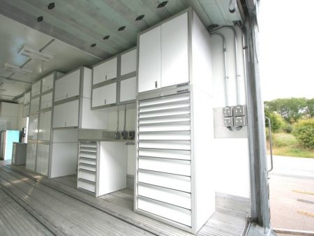 White Moduline Lightweight Aluminum Cabinets In A Government Trailer