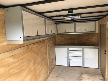 White Sportsman II™ Aluminum Cabinets in a V-Nose Trailer