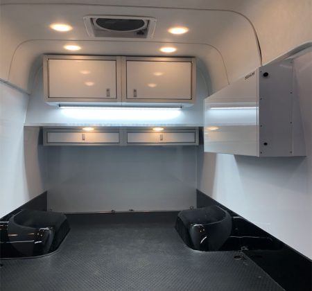 Sprinter Van With White Moduline Aluminum Cabinets and Folding Workstation