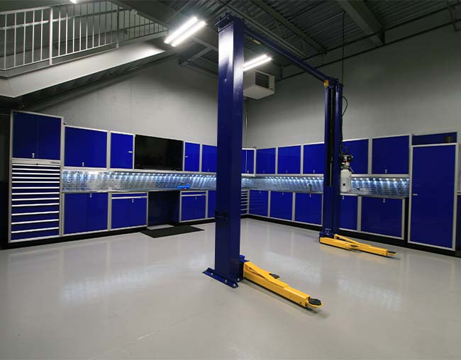 Blue Pro II Series cabinet setup in high end garage with auto lift