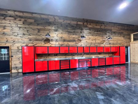 Red Moduline Cabinets with Black Frames in a Residential Garage