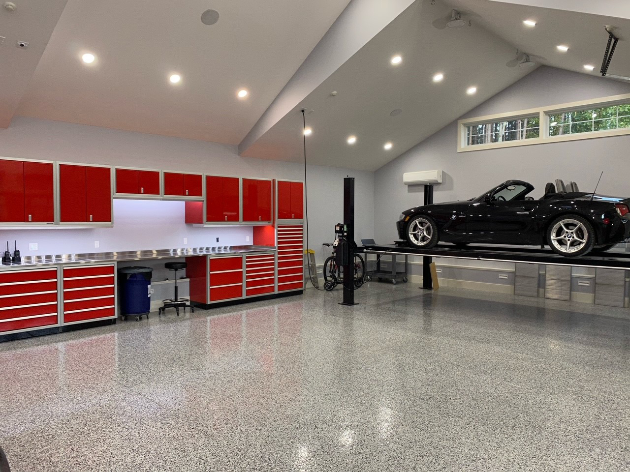 Red Moduline Cabinets in a high end residential garage